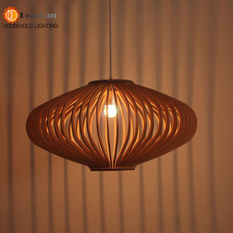 Elegantly cut wooden pendant in 3 sizes