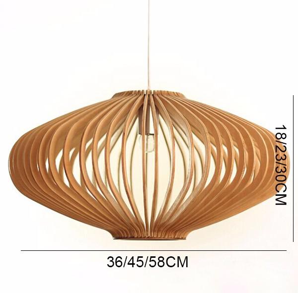 Elegantly cut wooden pendant in 3 sizes